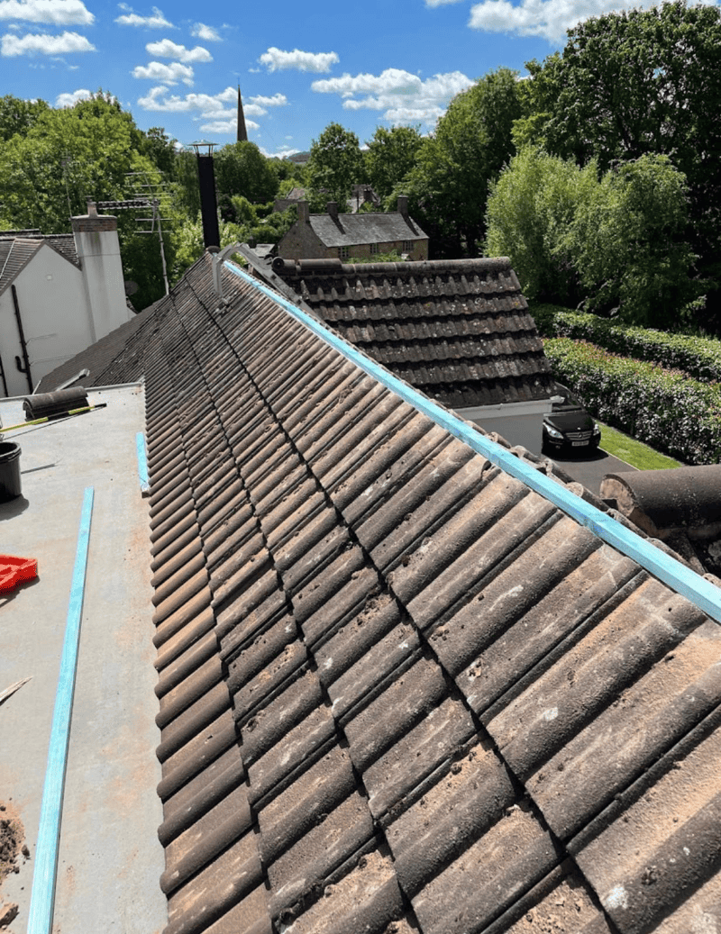 Why choose HLM Roofing Company for dry verge and ridge tiles in Huntingdon