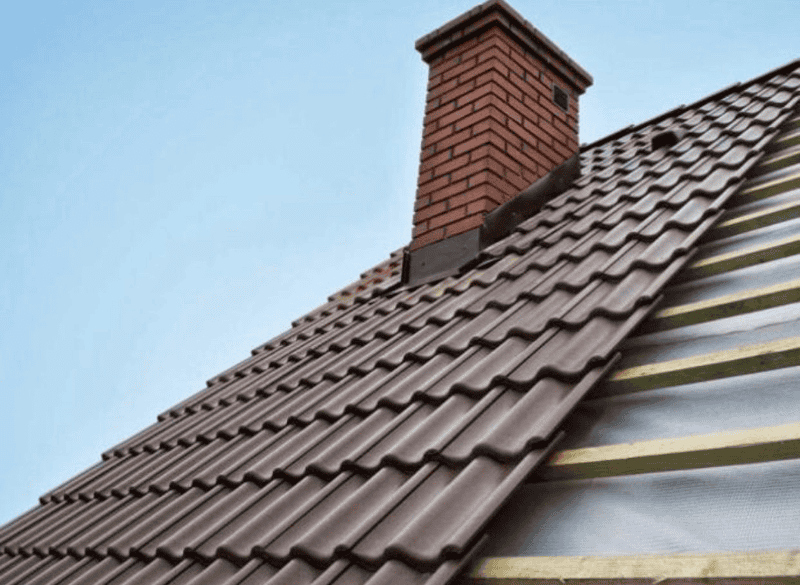 HLM Roofing Company repointing a chimney in Huntingdon