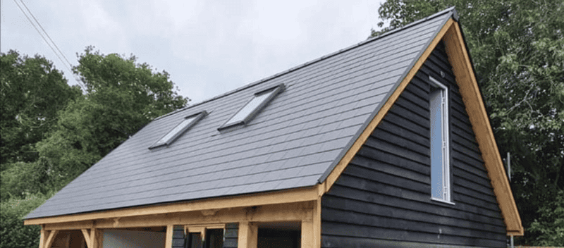 HLM Roofing Company fitting a slate and tile roof in Huntingdon, Cambridgeshire